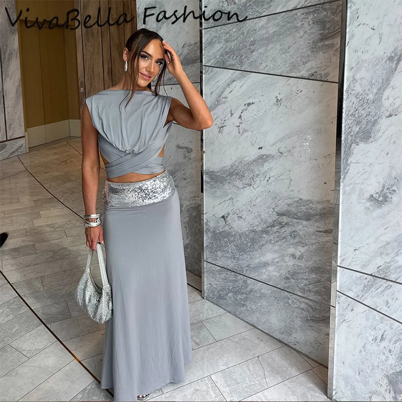 Conjunto elegante de top corto drapeado sin mangas y falda larga hasta el suelo con lentejuelas brillantes — Novedad 2026: Vestido de fiesta y gala para primavera-verano